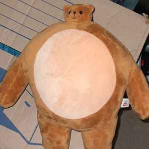 Tiny head large body teddy bear